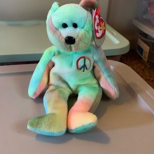 Selling a peace bear ty with beautiful colors $14